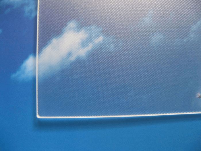 Low iron tempered solar glass